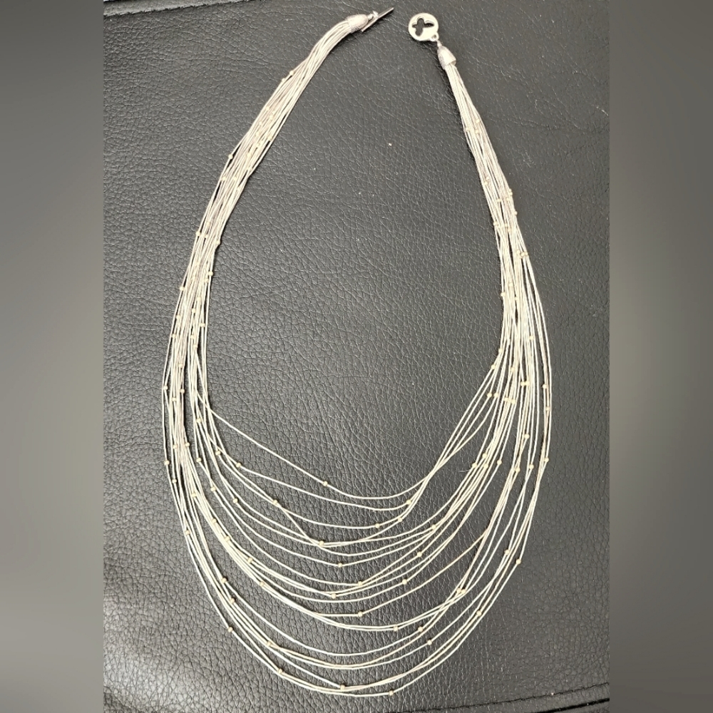 Beautiful sterling and gold silk necklace; Gold Silk Inc